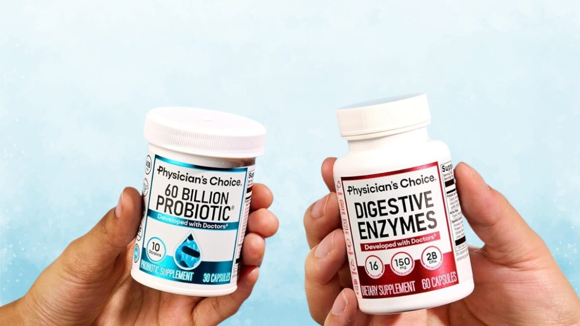 Two hands holding Physician's Choice probiotic and digestive enzyme bottles against a light blue background.