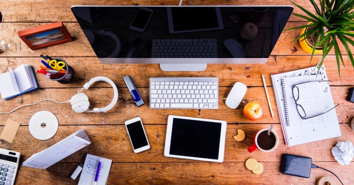 Modern desk setup with gadgets from The Ultimate Amazon Haul, tech accessories displayed on wooden workspace